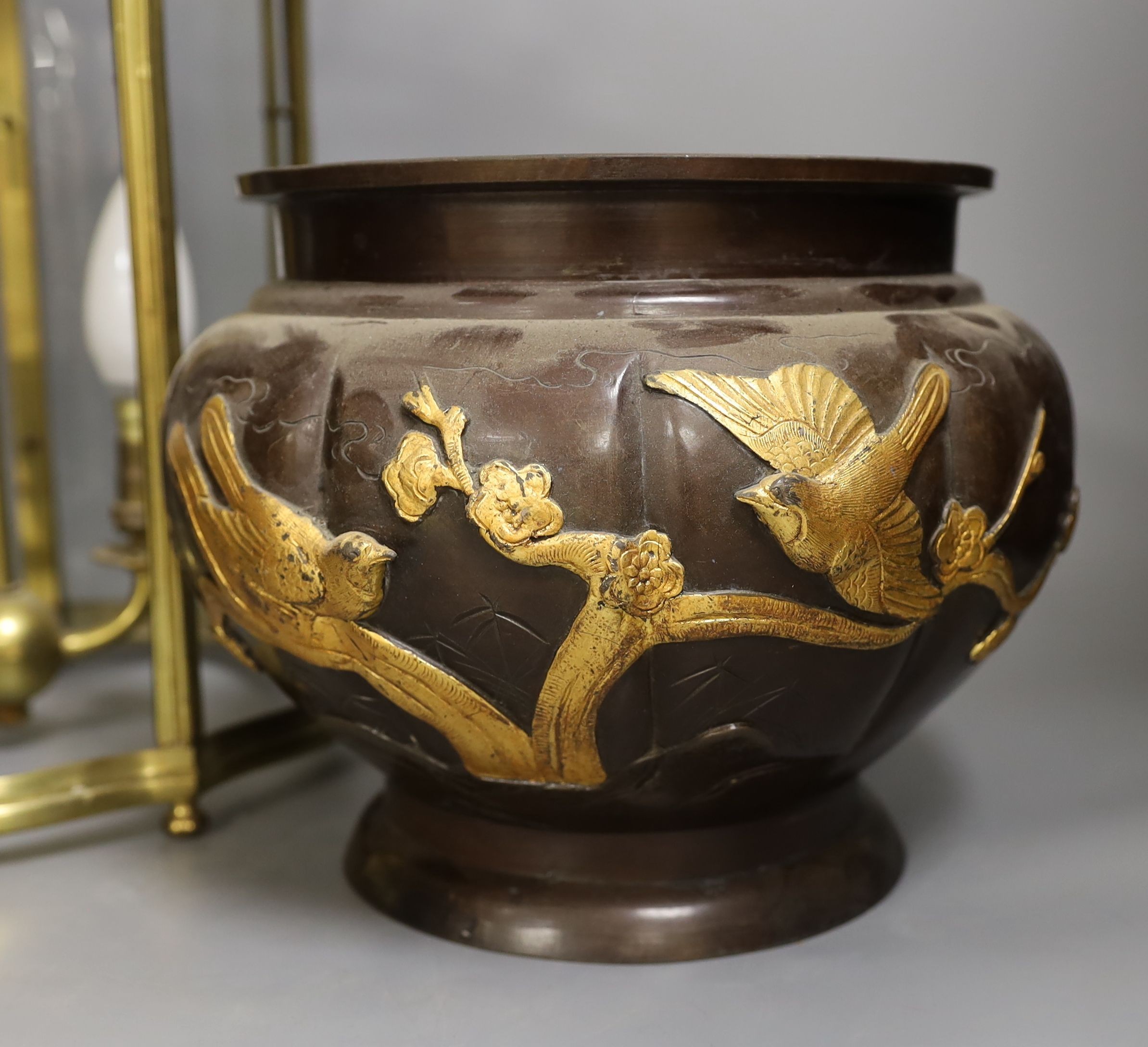 A three light brass lantern and a Japanese bronze jardiniere